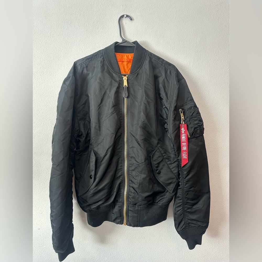 This Alpha Industries MA-1 Flight Jacket Bomber Jacket